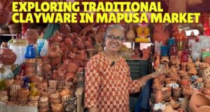 Exploring Traditional Clayware in Mapusa Market.