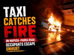 Taxi catches fire on Mapusa–Parra road; occupants escape unhurt