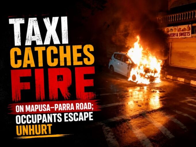 Taxi catches fire on Mapusa–Parra road; occupants escape unhurt