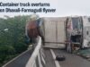 Container truck overturns on Dhavali-Farmagudi flyover, driver injured